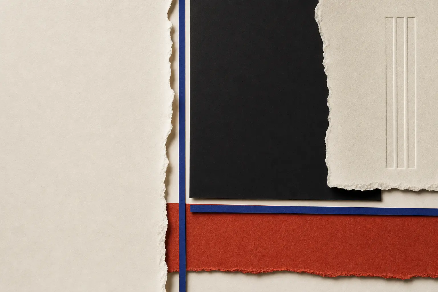 Layered ivory papers with blind lines and one cobalt painted block.