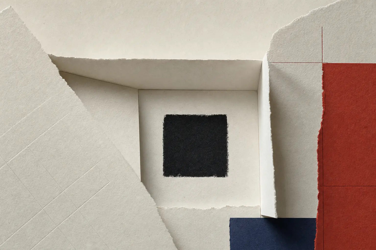 Folded ivory paper frame surrounding a black square beside a red field.
